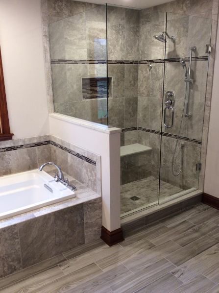 Luxury shower and bathtub with glass enclosure